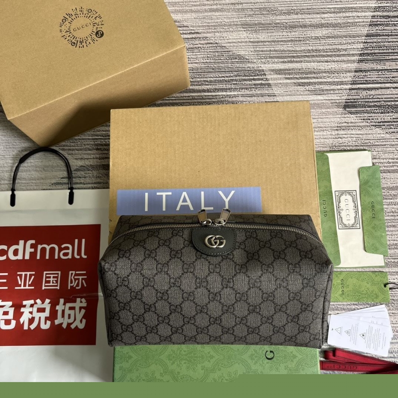 G*u*i clutch bags